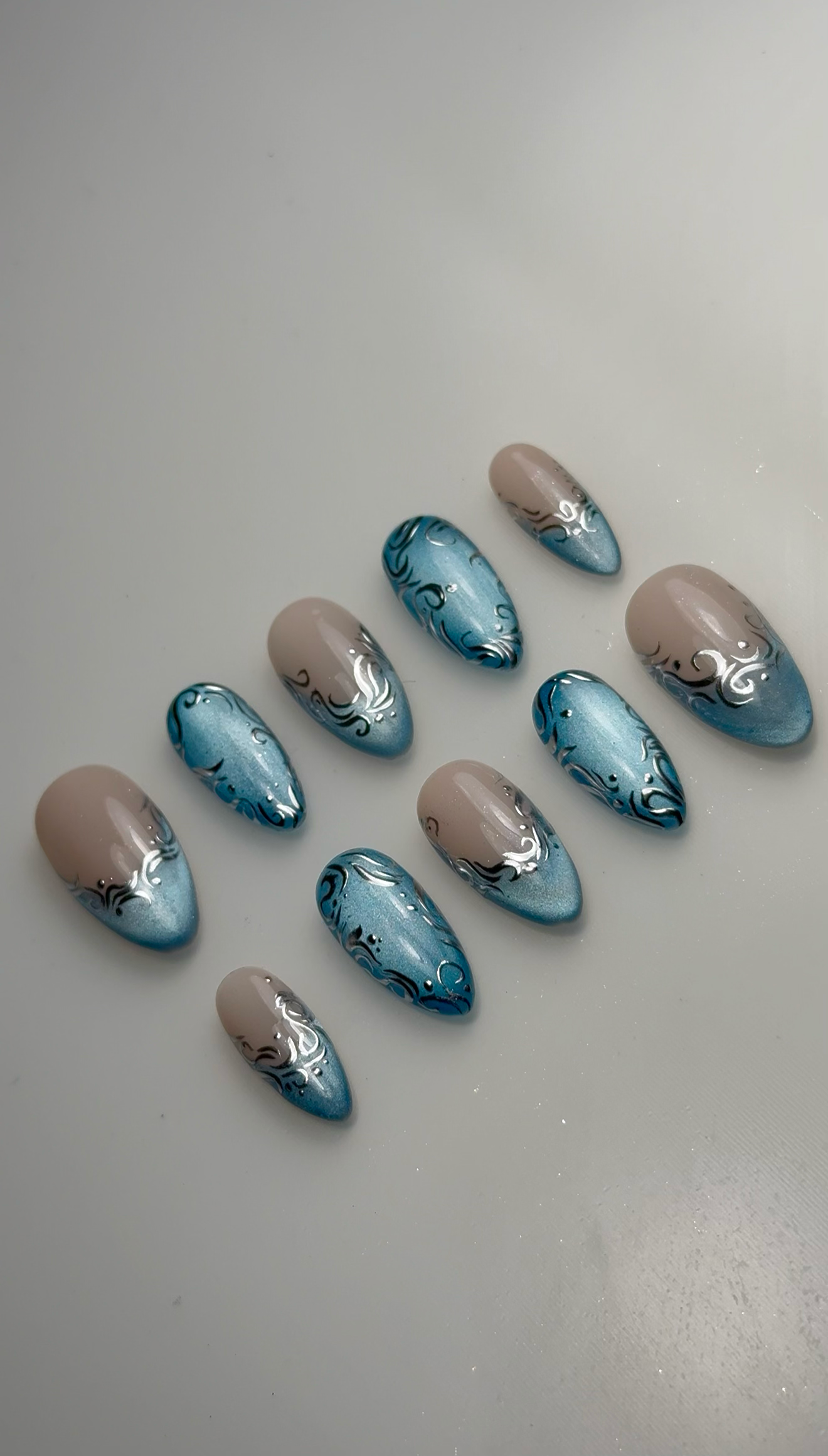 Blue Cat Eye + Silver Chrome Accent Nails